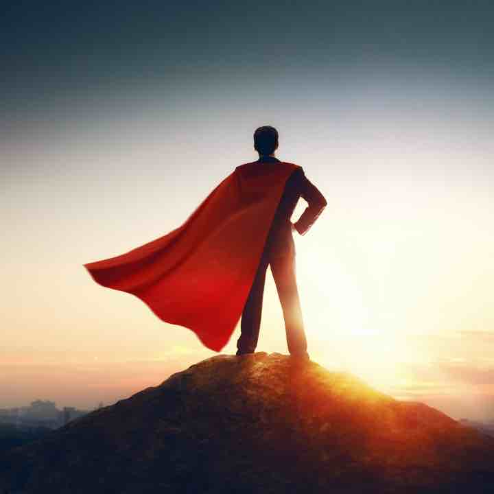superhero businessman looking at city